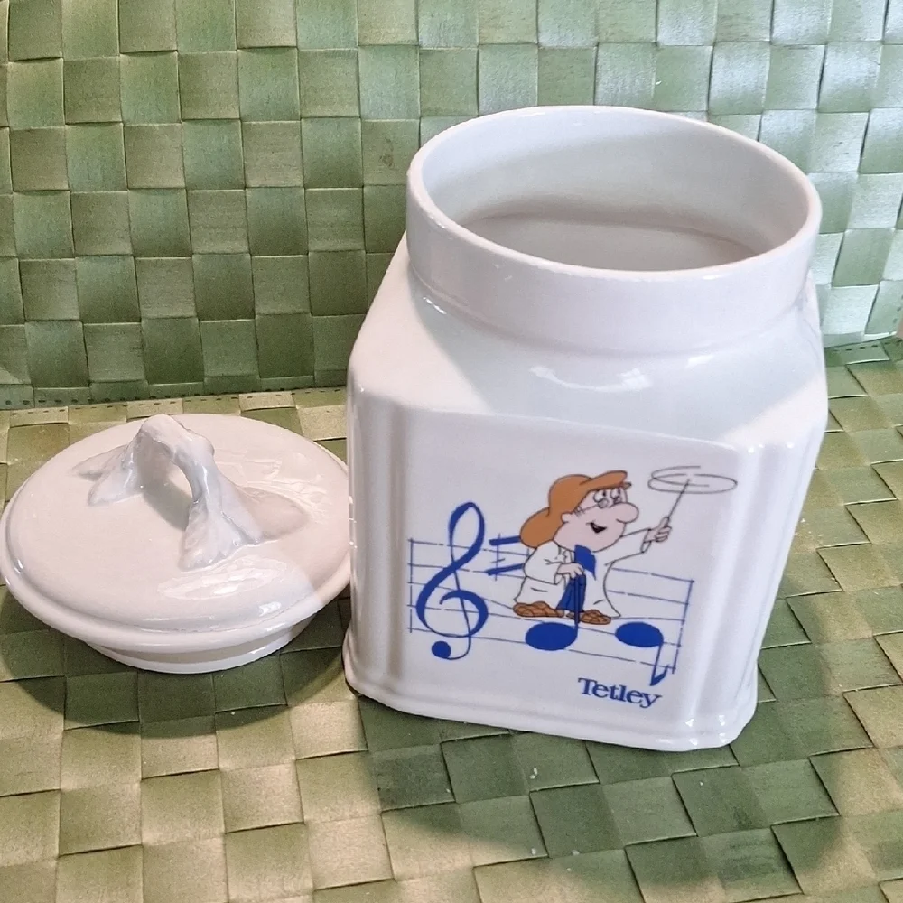 White Ceramic Tea Canister with Blue Musical Design